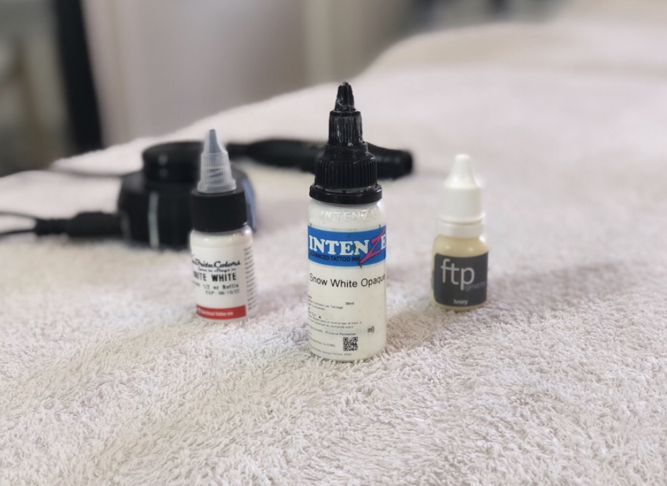 titanium dioxide tattoo ink skin camouflage