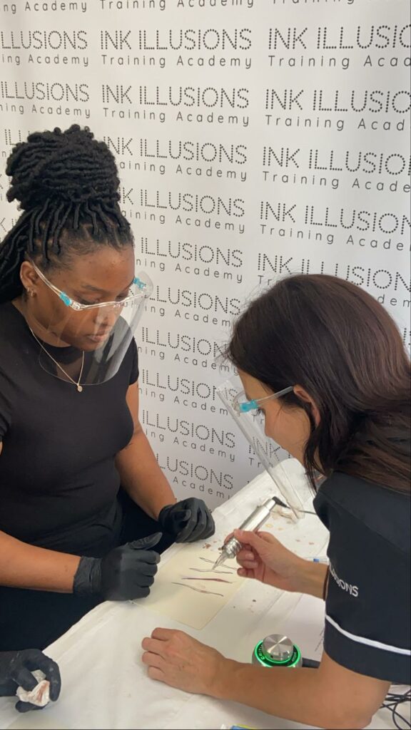 teaching a student how to tattoo stretch marks